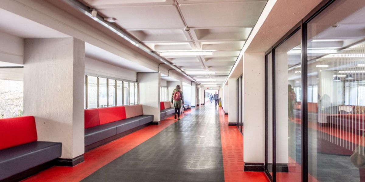 The university's Red Route running alongside the Edward Boyle library.