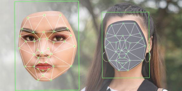 Illustration of a deepfake being made - a woman's face is shown being swapped with another face.