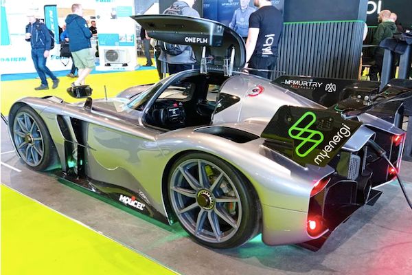 Electric sports car on display at an expo
